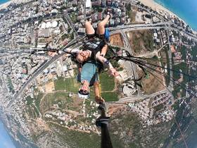 Paragliding over a city