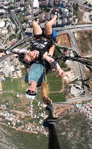 Paragliding over a city